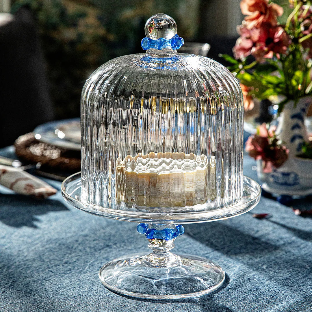 Nell Ruffle Chambray cake dome and pedestal stand displayed in an elegant dining and entertaining setting
