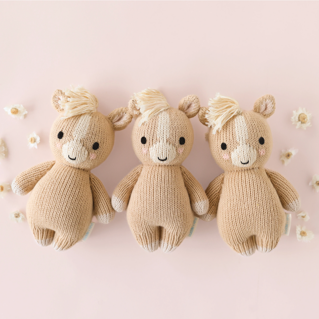 Image of three of Cuddle+Kind&