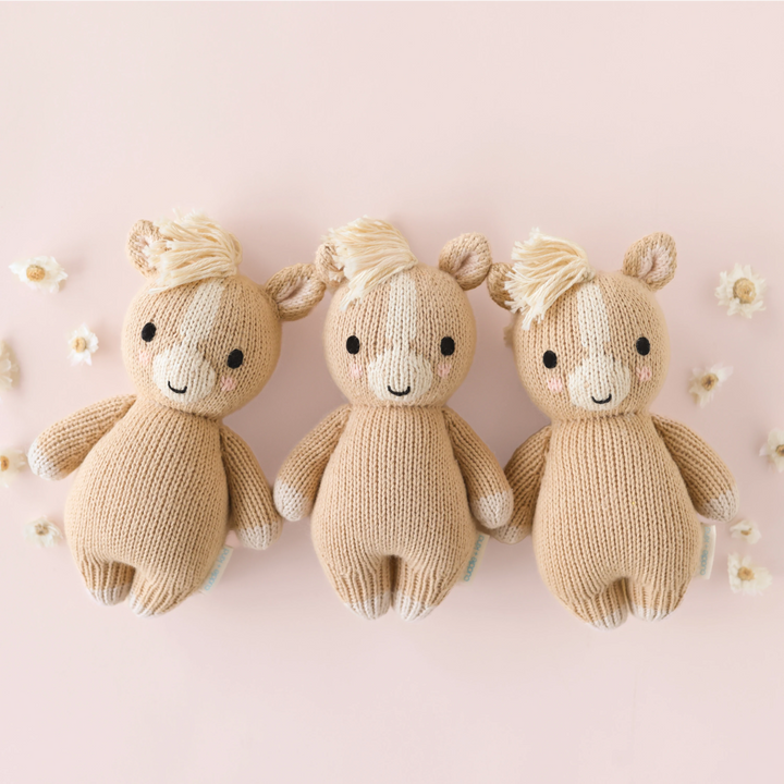 Image of three of Cuddle+Kind&