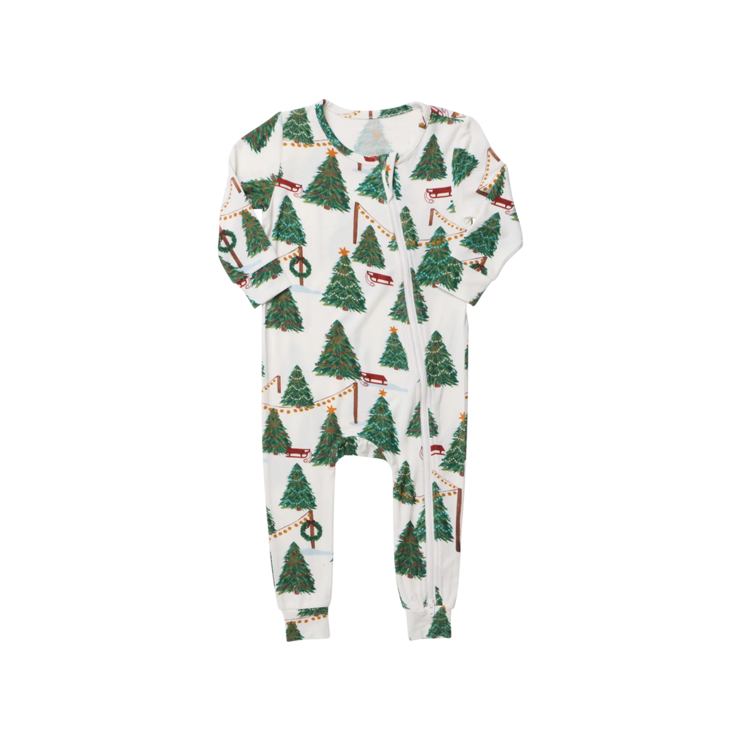Baby Bamboo Christmas Romper in Christmas Tree Farm featuring decorated green Christmas trees, red sleds, and a front zipper.