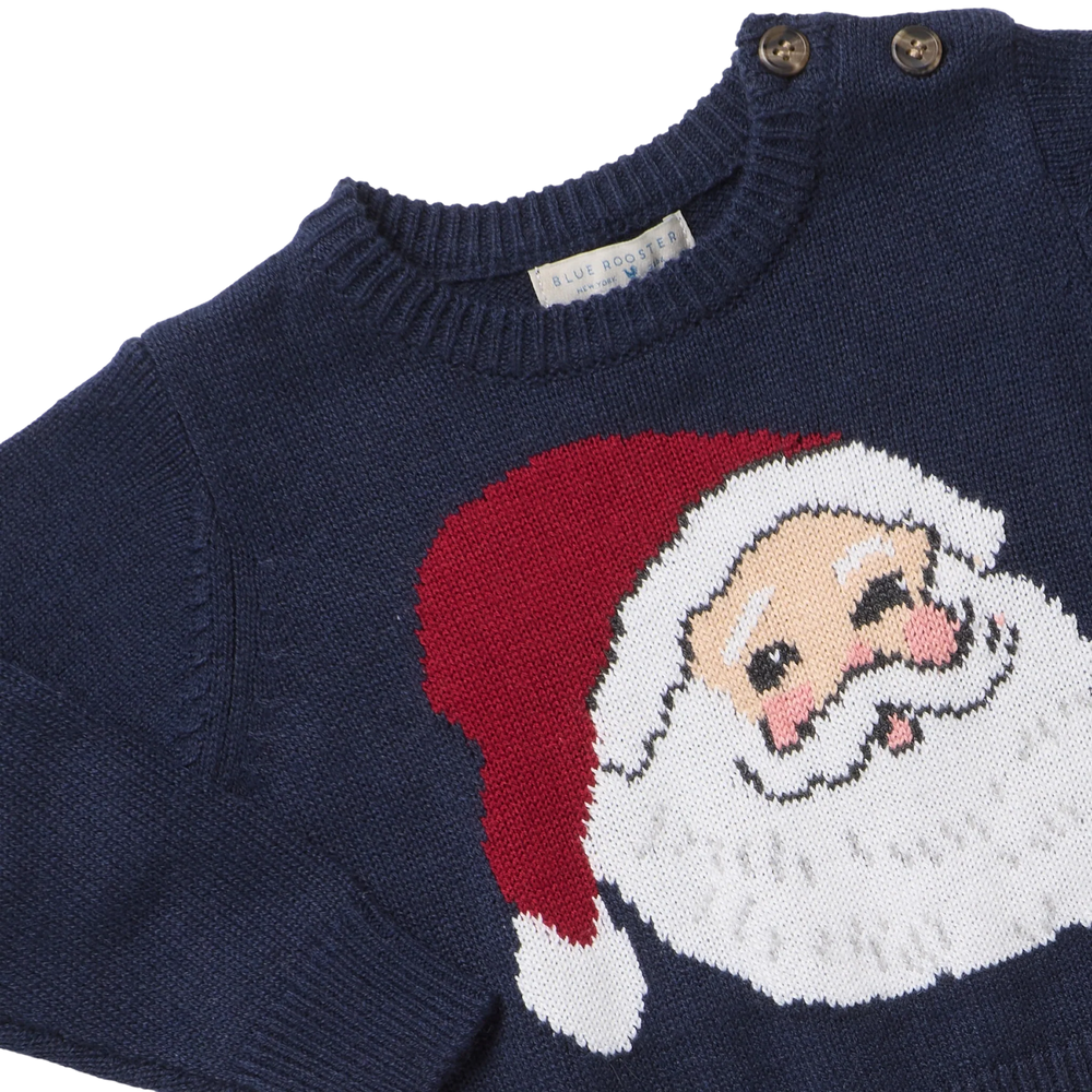 Close-up of Baby Boys Oliver Sweater Navy Santa showing the knit Santa design and shoulder button details