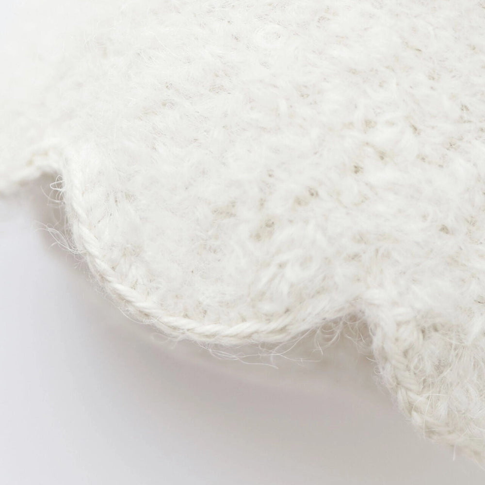 Close-up of the soft white knit texture on the Baby Ghost with Pumpkin