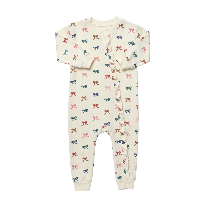 Baby Girl Bow Romper in cream featuring colorful pink, blue, green and brown bows with front ruffle detail and long sleeves