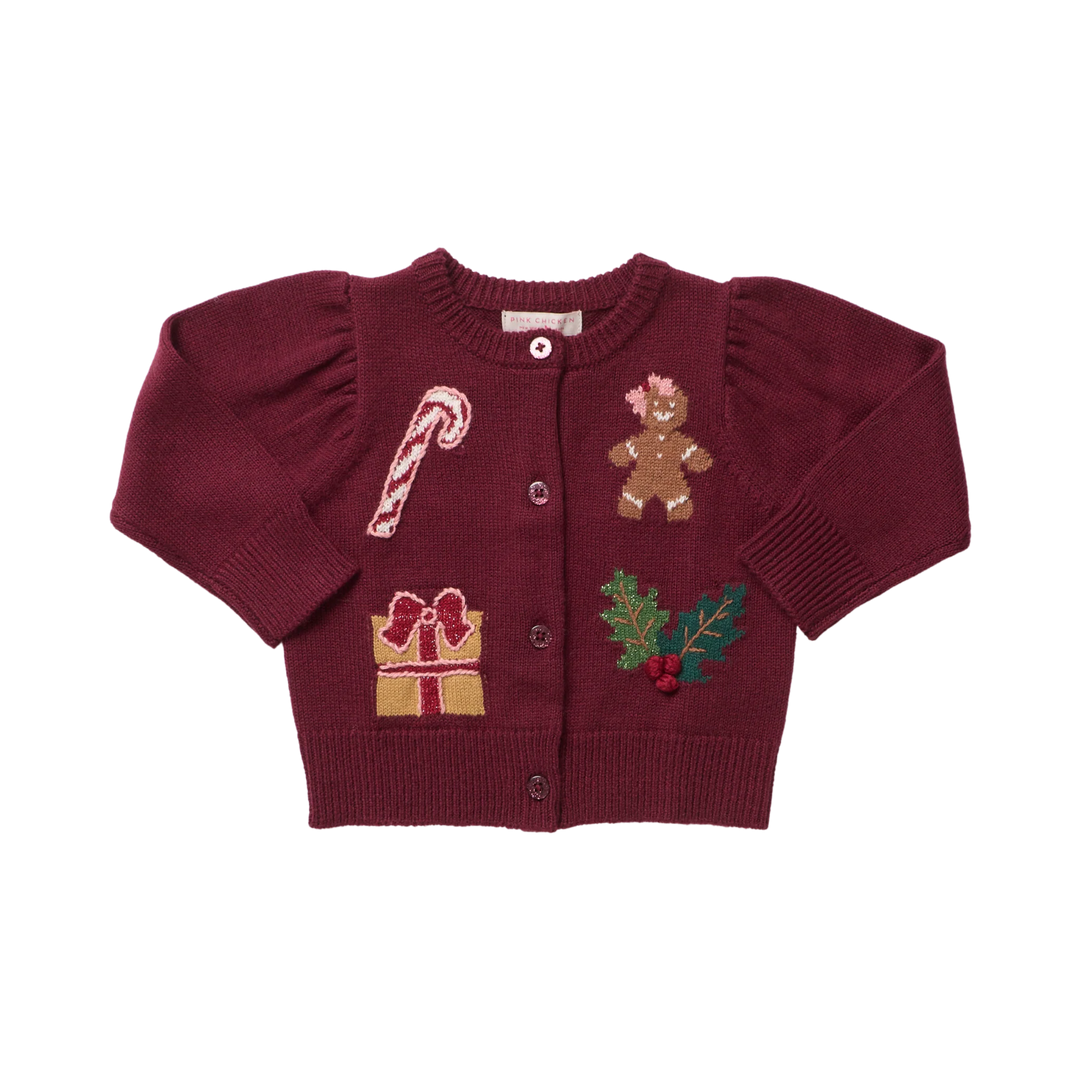Pink Chicken Baby Girls Constance Sweater in burgundy featuring festive gingerbread, candy cane, Christmas present, and holly patches.