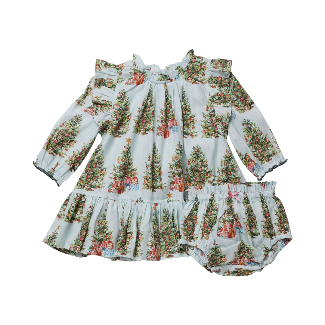 Pink Chicken Baby Girls Harper Dress Set in Trees and Presents featuring a blue Christmas tree print, ruffled shoulders, and matching bloomers.