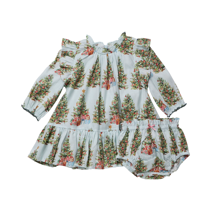Pink Chicken Baby Girls Harper Dress Set in Trees and Presents featuring a blue Christmas tree print, ruffled shoulders, and matching bloomers.