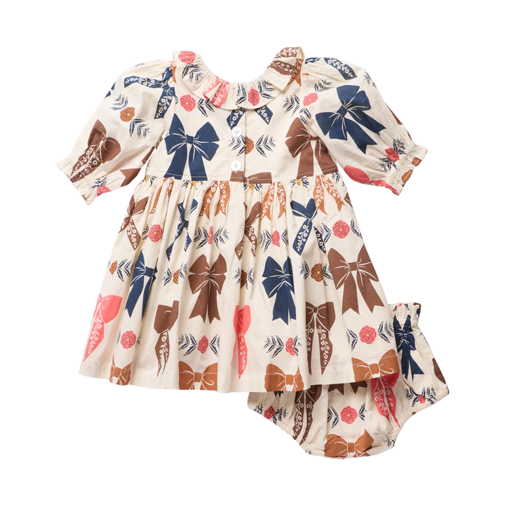 Back view of Baby Girls Harvest Bow Dress Set with button closure and matching printed bloomers