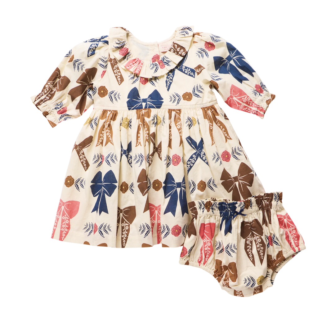 Baby Girls Harvest Bow Dress Set in cream with colorful bow and floral print and matching bloomers