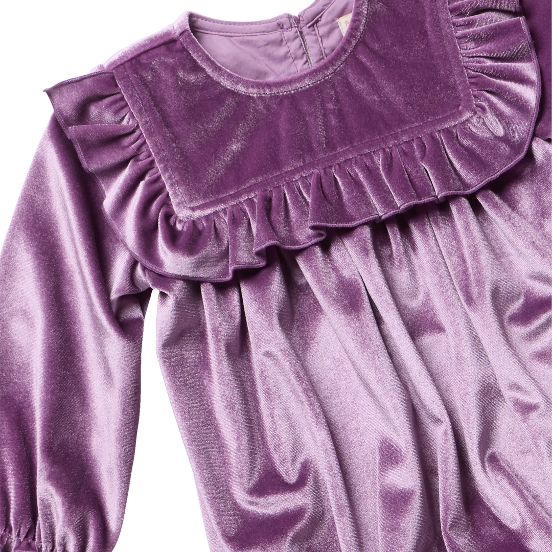 Close-up of Baby Girls Quinn Bubble Lavender Velour showing soft velvet texture and ruffled bib detail