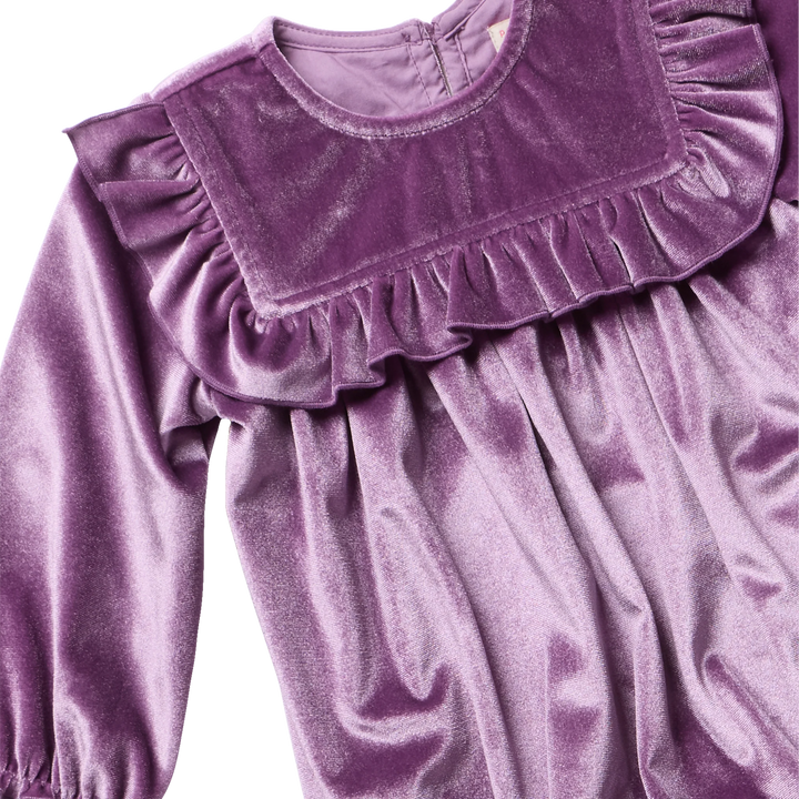 Close-up of Baby Girls Quinn Bubble Lavender Velour showing soft velvet texture and ruffled bib detail