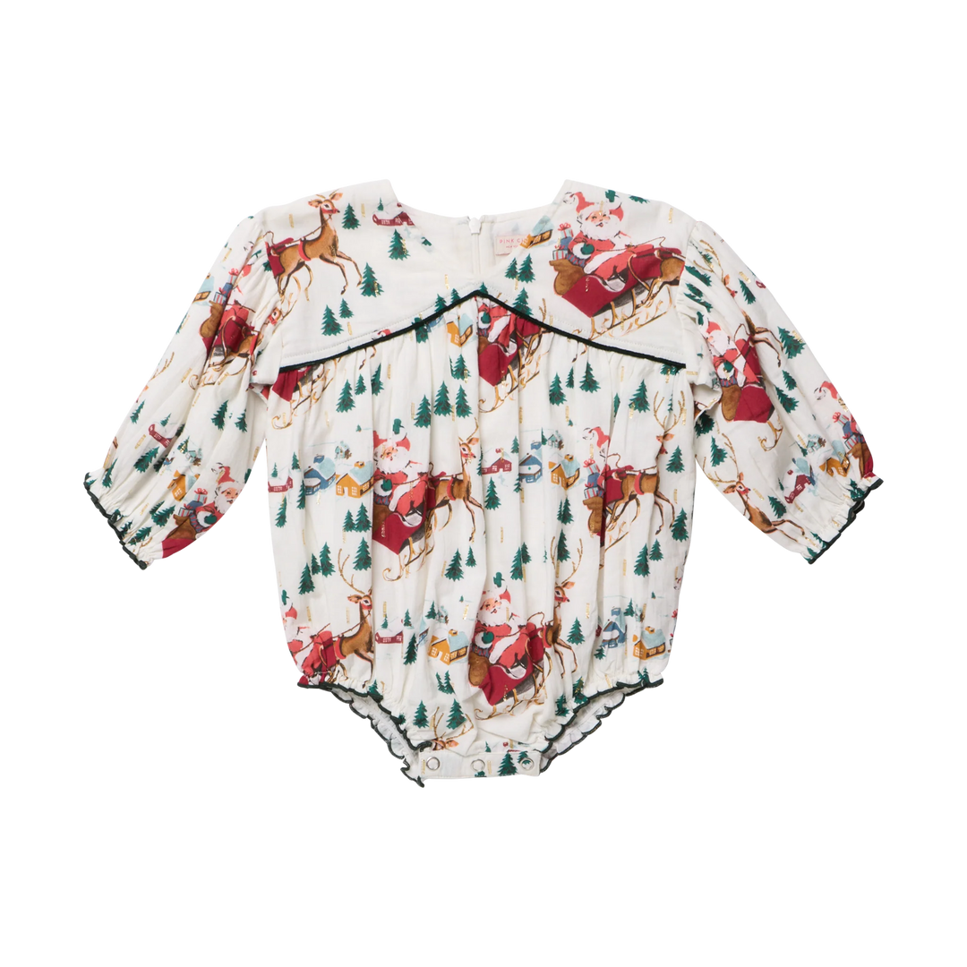Pink Chicken Baby Girls Wynne Bubble in Santa Sleigh featuring a Christmas print, long puff sleeves, and green trim