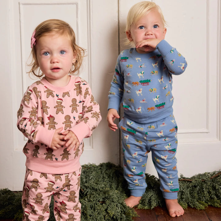 Toddler wearing blue Baby Jax Holiday Labs Jogger Set with festive puppy print