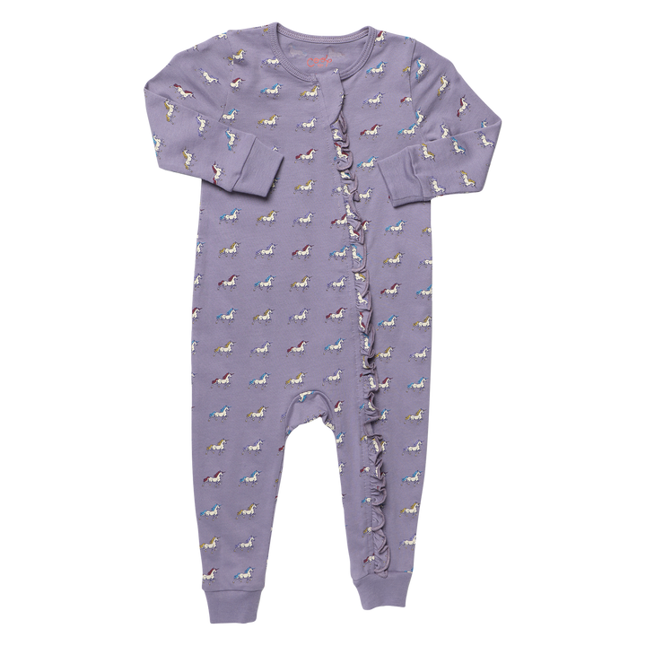 Purple baby unicorn romper featuring colorful allover unicorns, long sleeves, ribbed cuffs, and ruffle trim along the front closure.