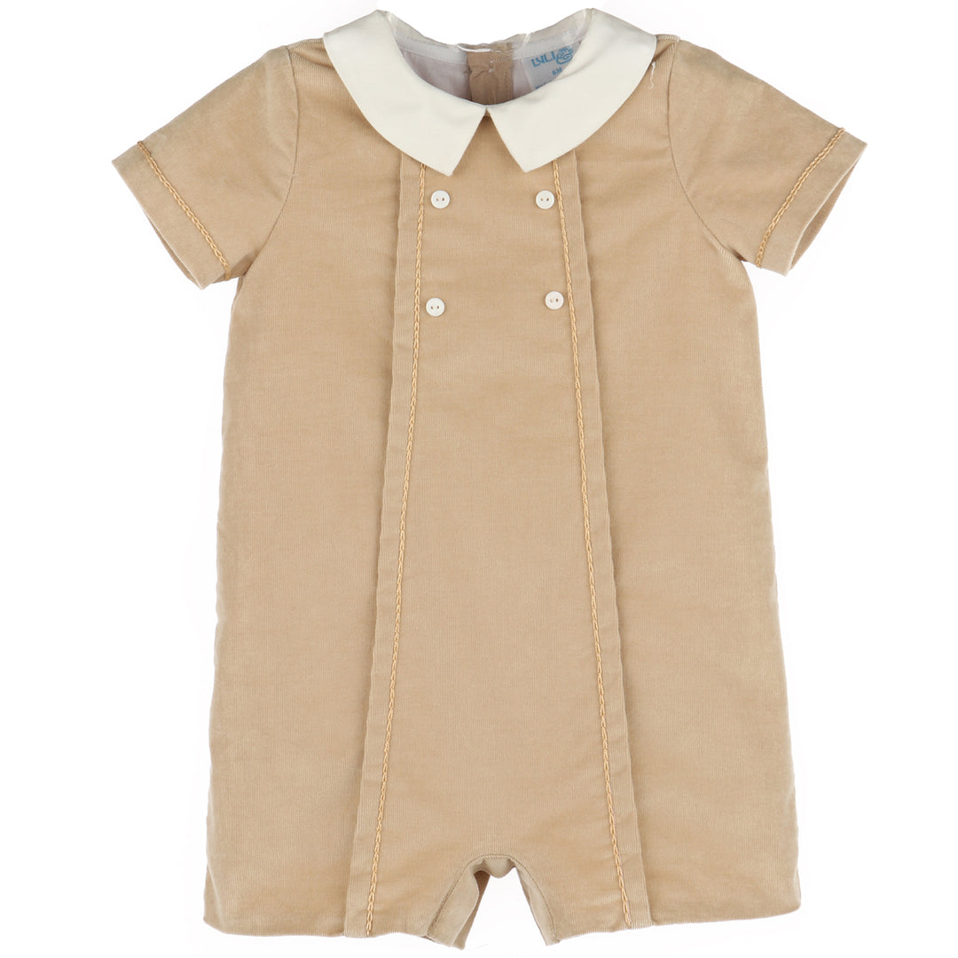 Front view of beige corduroy baby boy romper with ivory Peter Pan collar, decorative buttons, tailored pleats, and short sleeves.