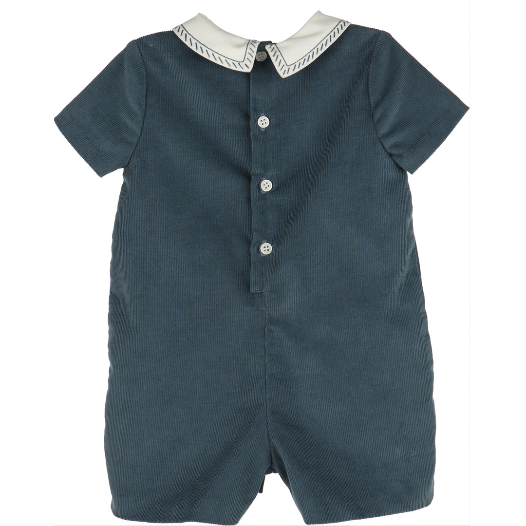 Back view of Blue Cozy Corduroy Romper featuring blue corduroy, short sleeves, white Peter Pan collar with blue stitching, and button-back closure.