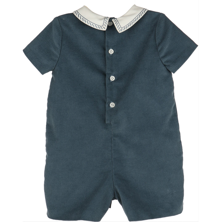 Back view of Blue Cozy Corduroy Romper featuring blue corduroy, short sleeves, white Peter Pan collar with blue stitching, and button-back closure.