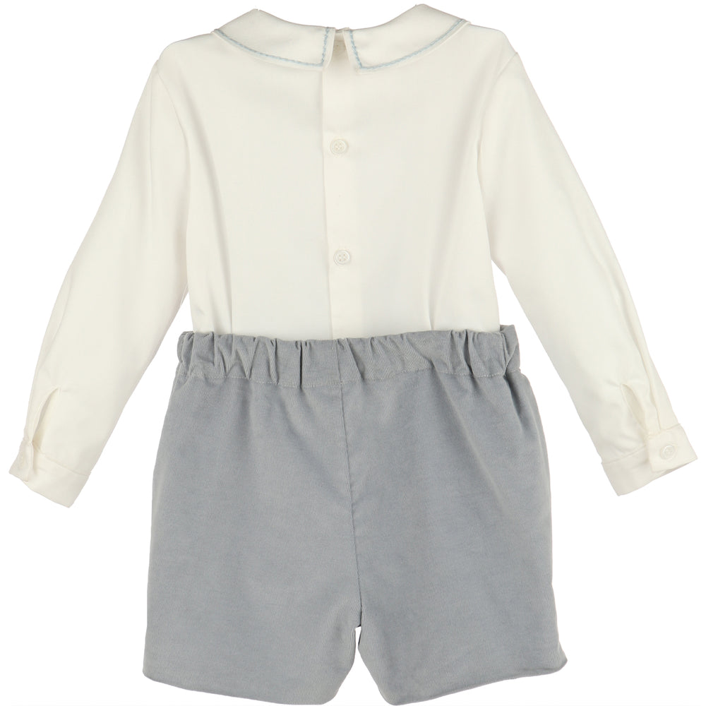 Back view of Blue Minicorduroy Set for boys featuring a white long sleeve shirt and blue corduroy shorts with elastic waist