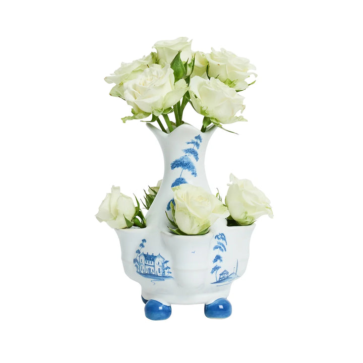 Blue and white chinoiserie multi-bud vase filled with white roses to showcase its multiple flower openings