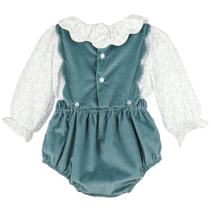 Back of Blue Willow OG Overall featuring blue corduroy, floral long sleeves, ruffle collar, and button details