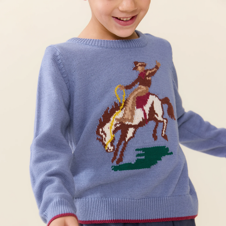 Close-up of Boys Bronco Sweater featuring colorful cowboy and bucking horse knit design