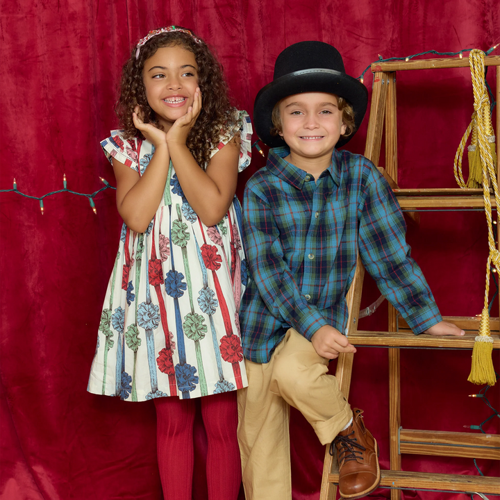 Boy wearing Blue Tartan Jack Shirt with khaki pants for holiday photos