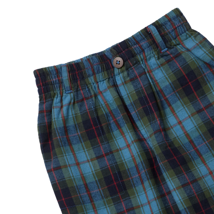 Close-up of Boys Jackson Pant Blue Tartan showing elastic waistband, belt loops, button, and plaid fabric