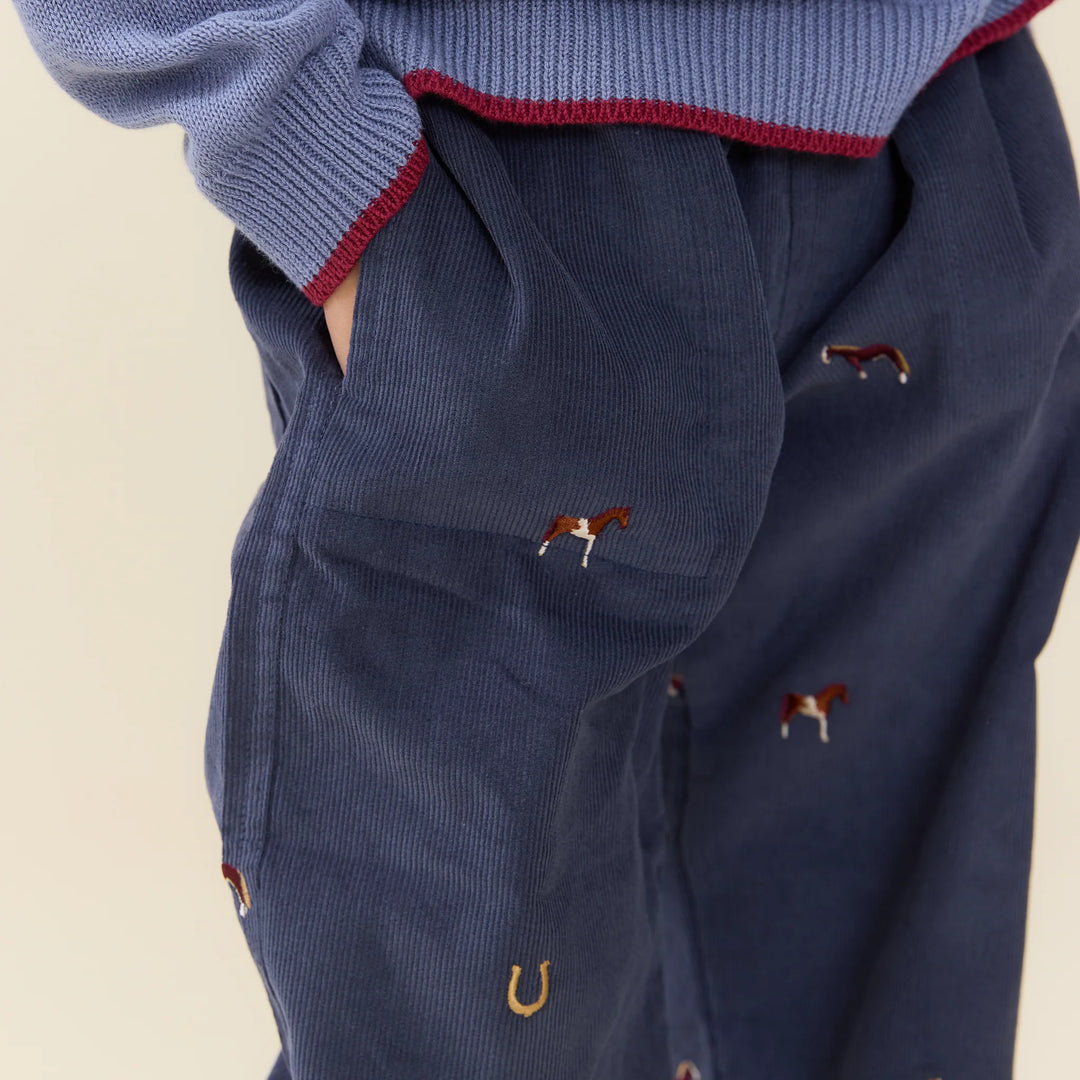 Close-up of Boys Navy Horse Embroidered Pants featuring horse and horseshoe embroidery