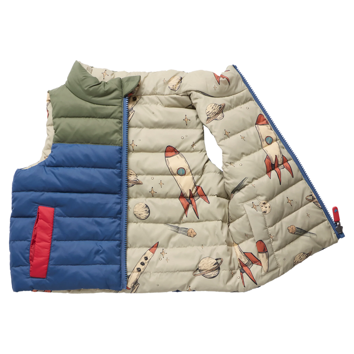 Boys Reversible Riley Vest Space Rocket opened to show blue exterior and rocket print reverse