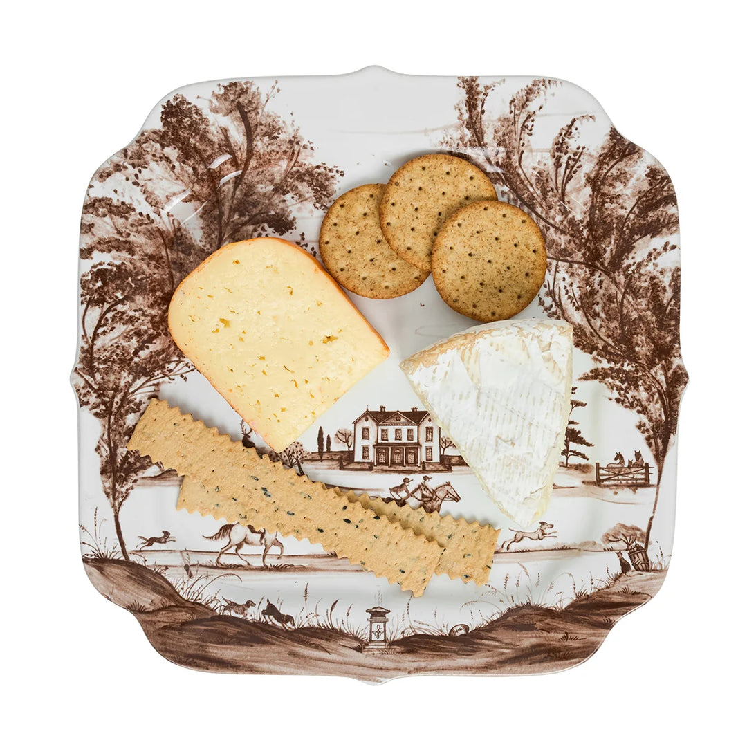 Brown toile square serving platter styled with cheese and crackers for serving appetizers and charcuterie