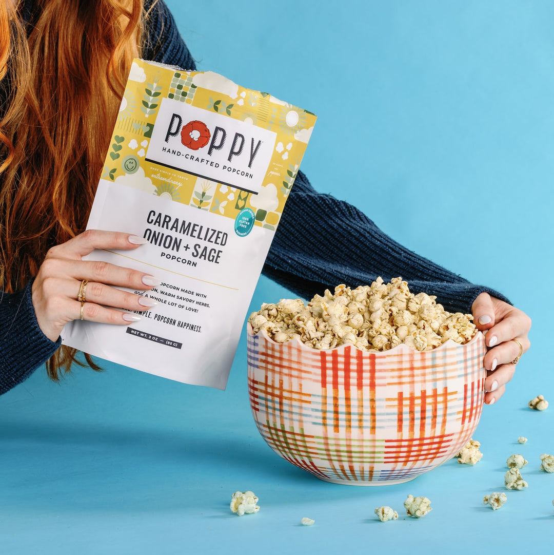 Poppy Caramelized Onion + Sage popcorn served in a colorful bowl