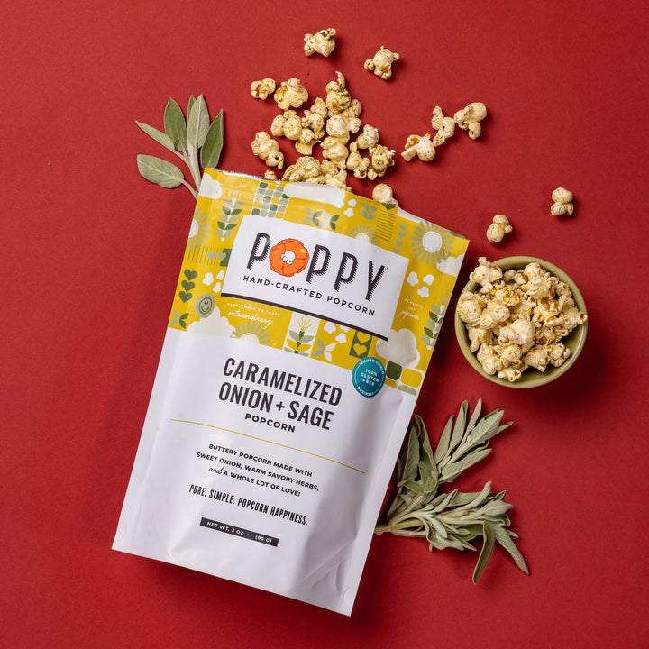 Caramelized Onion + Sage Hand-Crafted Popcorn with fresh sage and a bowl of popcorn