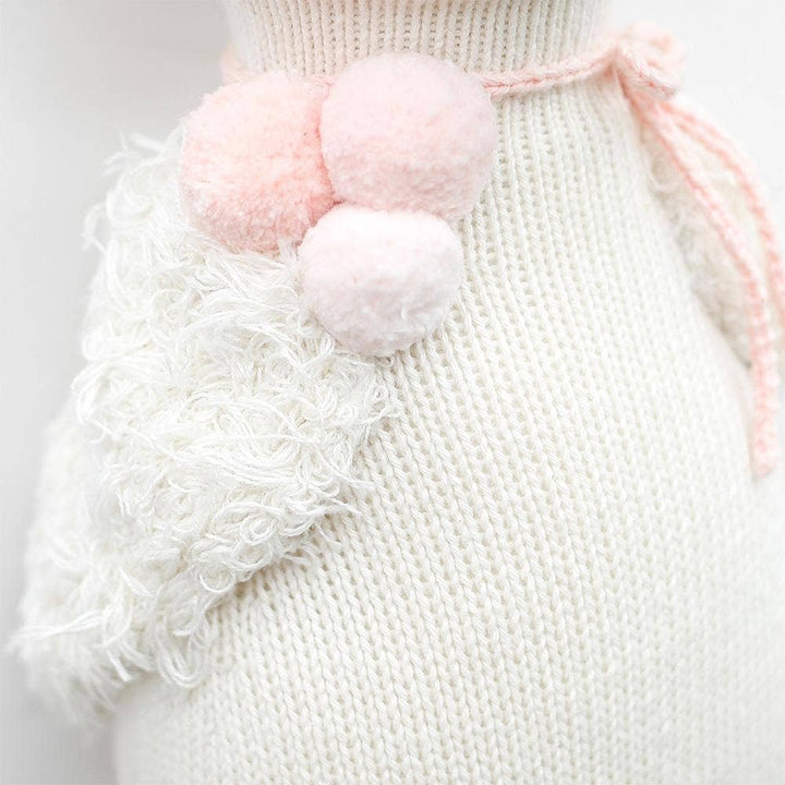 Close up image of the neck detailing on Cuddle+Kind&