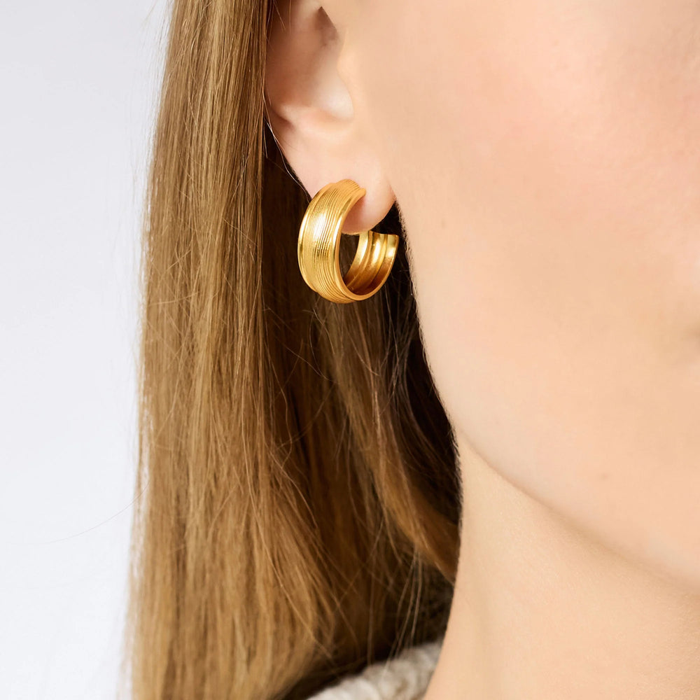 Cobblestone Hoop Earrings in gold styled on model
