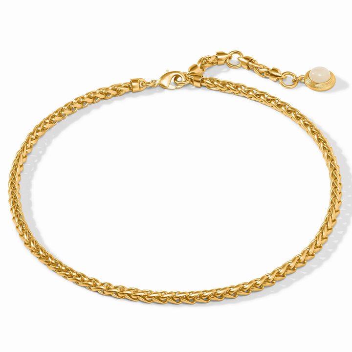 Overhead view of gold Cobblestone Link Necklace with adjustable chain and stone accent