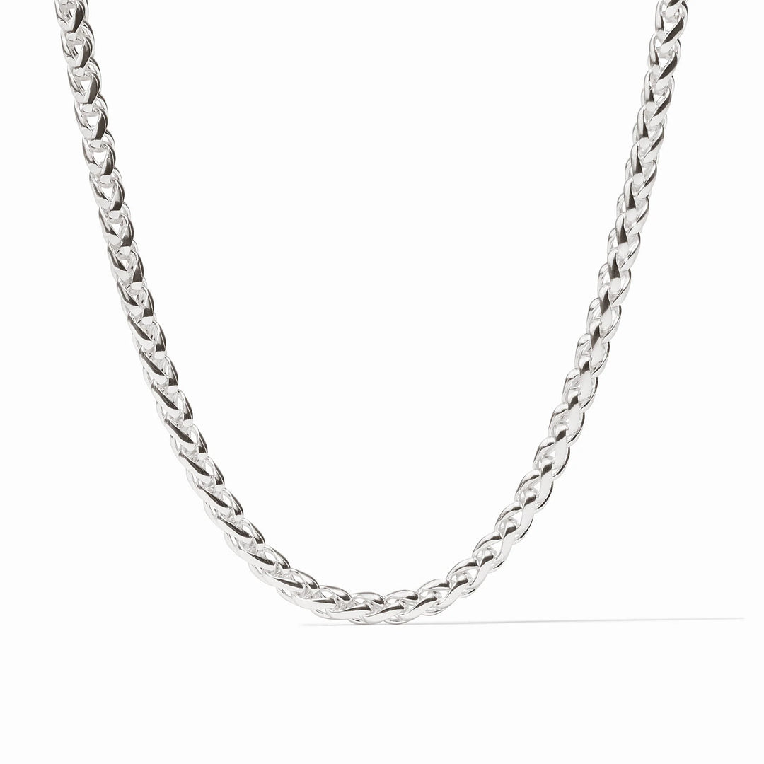 Silver Cobblestone Link Necklace layered with coordinating silver chains on model