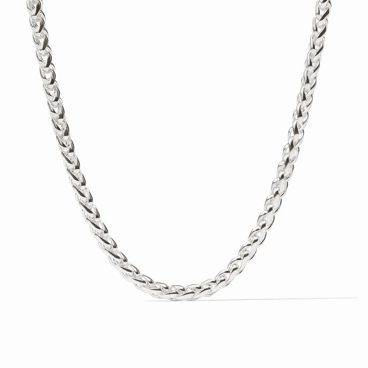 Silver Cobblestone Link Necklace layered with coordinating silver chains on model