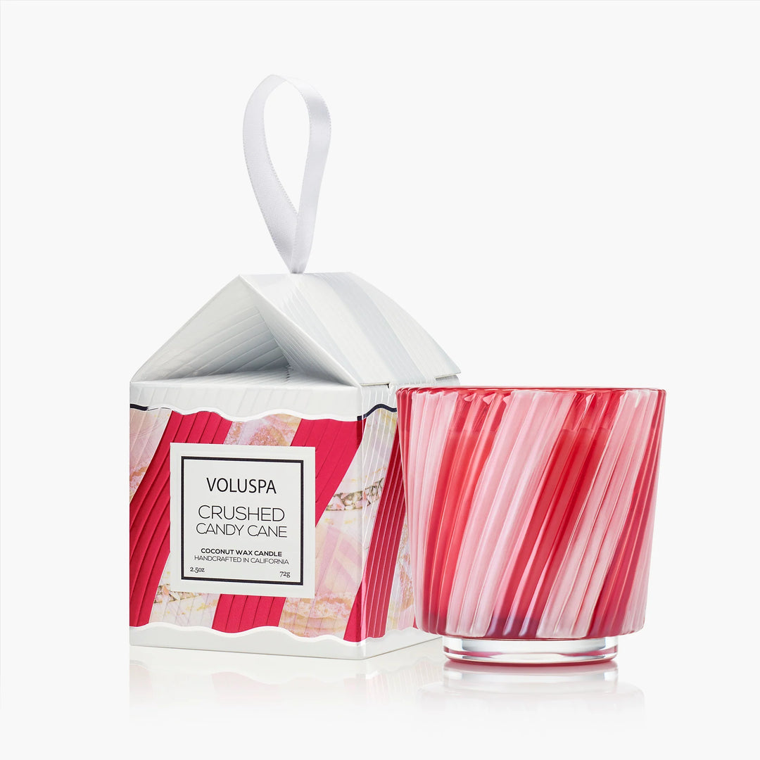 Voluspa Crushed Candy Cane Ornament Pedestal Candle in red and pink striped glass with festive ornament gift box