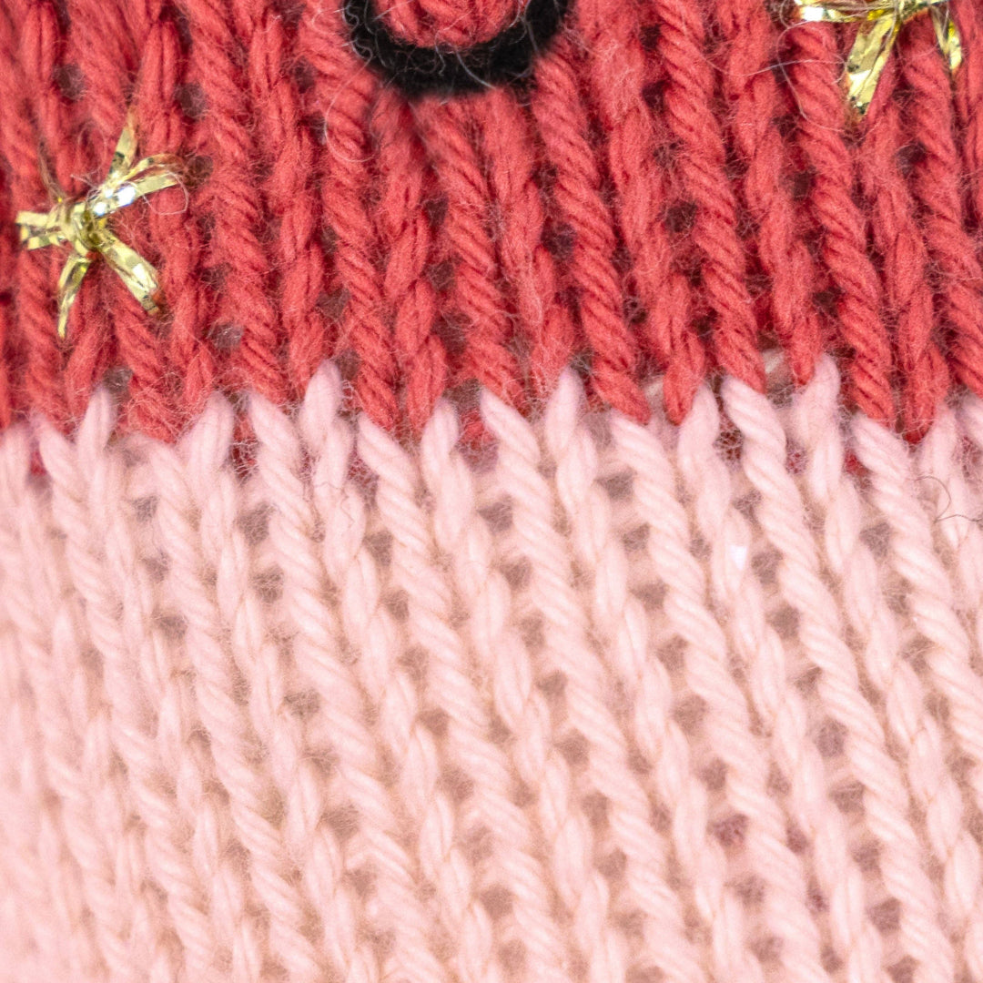 Close up image of the yarn pattern on Cuddle+Kind&