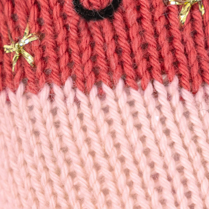 Close up image of the yarn pattern on Cuddle+Kind&