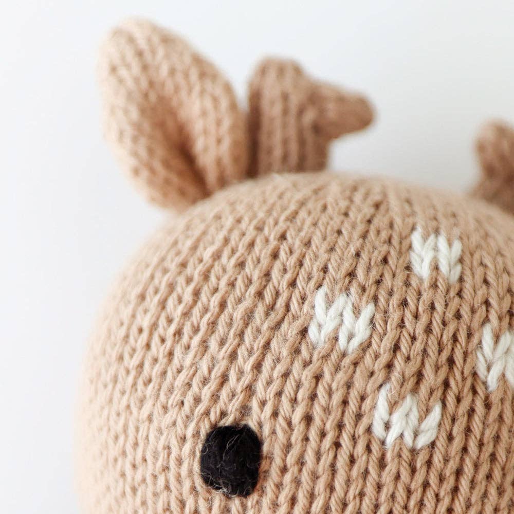 Close up image of the head of Cuddle+Kind&