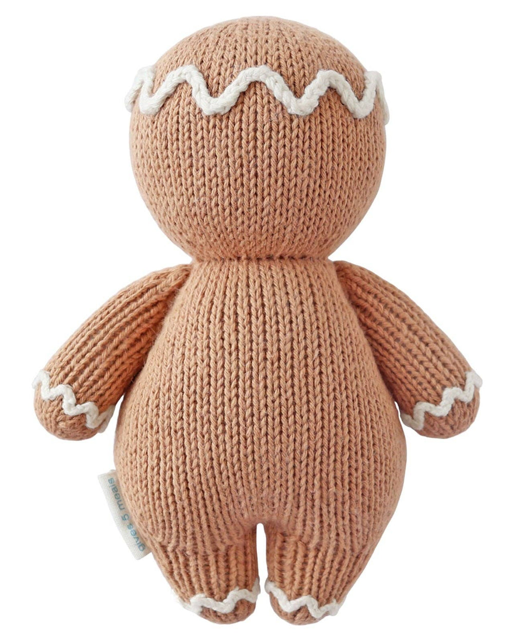 Flat image of the back of Cuddle + Kind's Baby Gingerbread Stuffed Toy in the color combination, candy swirl. 
