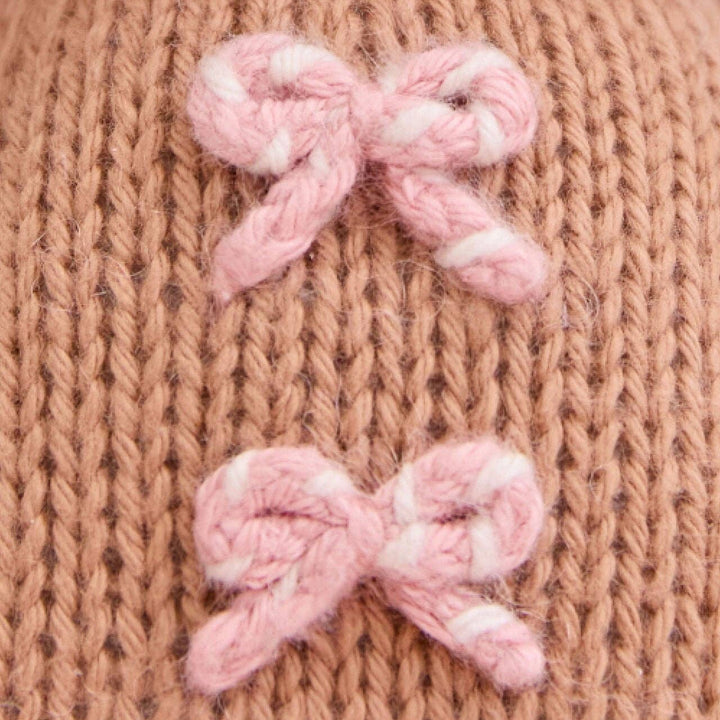 Close up shot of the bow detailing on Cuddle + Kind&