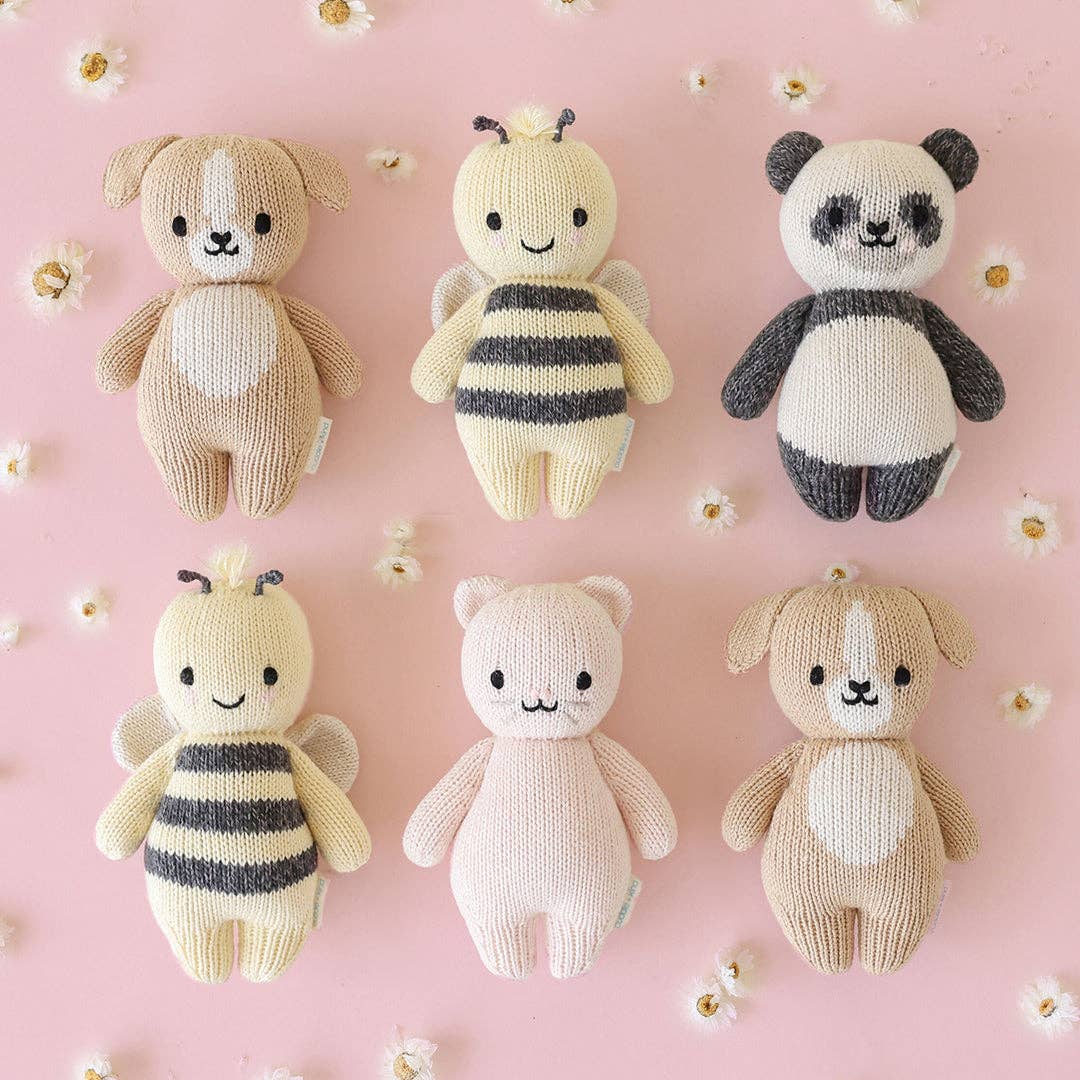 Cuddle+Kind Baby Panda plush staged with their Baby bee, Baby Puppy, and Baby Kitten