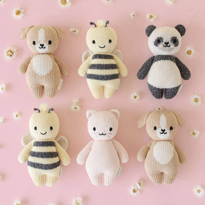Cuddle+Kind Baby Panda plush staged with their Baby bee, Baby Puppy, and Baby Kitten