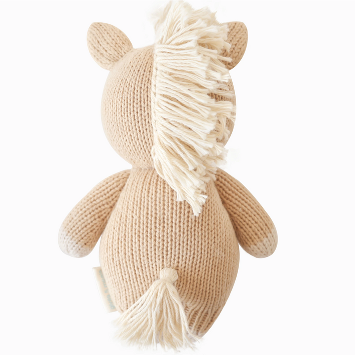 Flat image of the back of Cuddle+Kind&