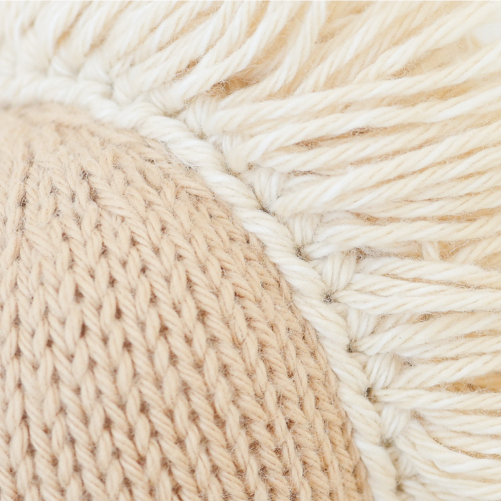 Close up image of the detailing of the mane on Cuddle+Kind&
