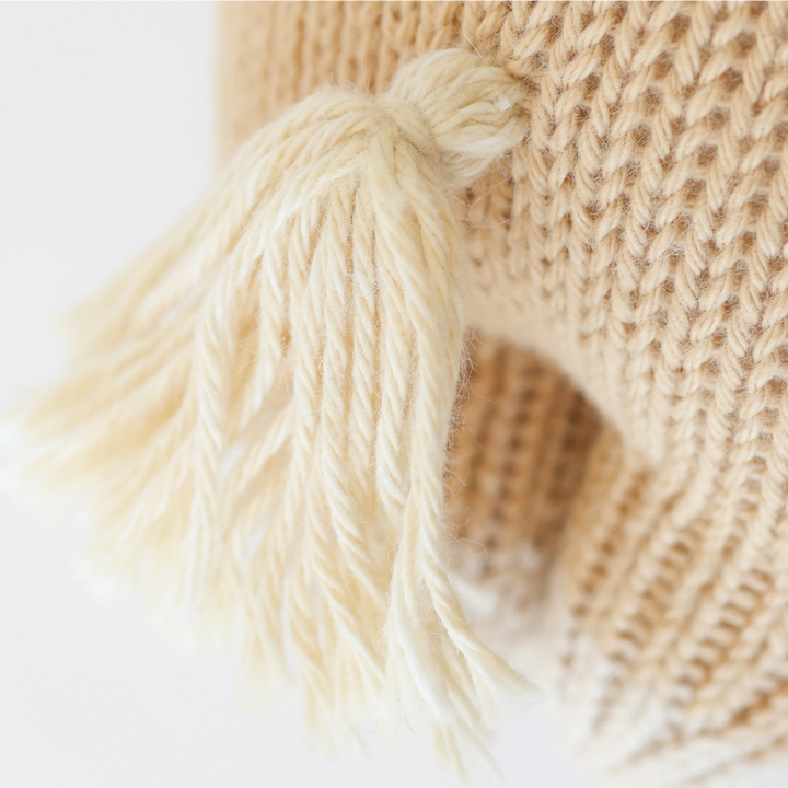 Close up image of the detailing of the tail on Cuddle+Kind&