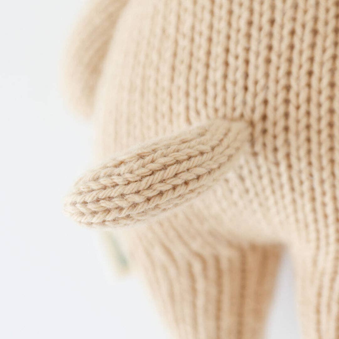 Close up image of the tail on Cuddle+Kind&
