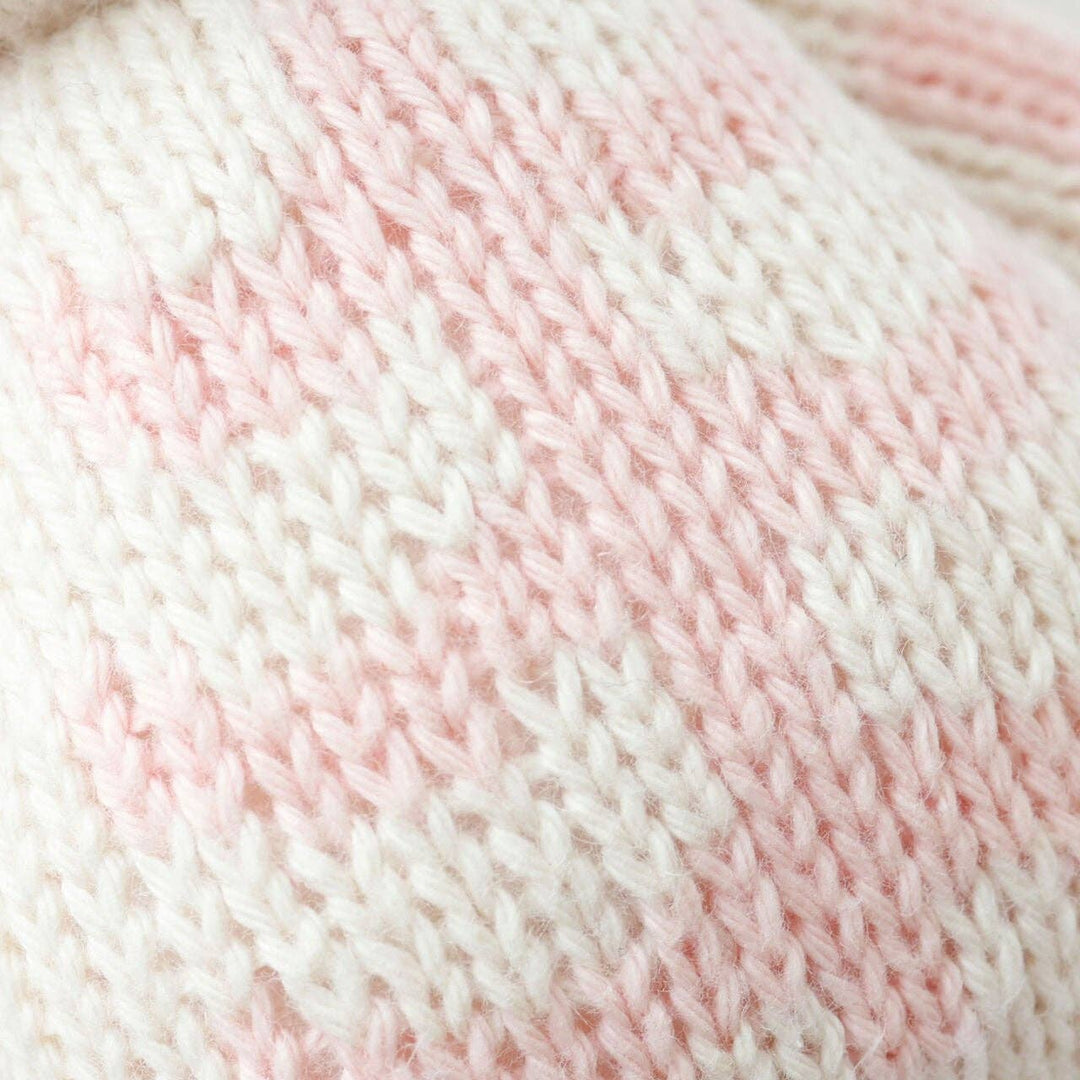 Close up image of the pink bone details on Cuddle+Kind&