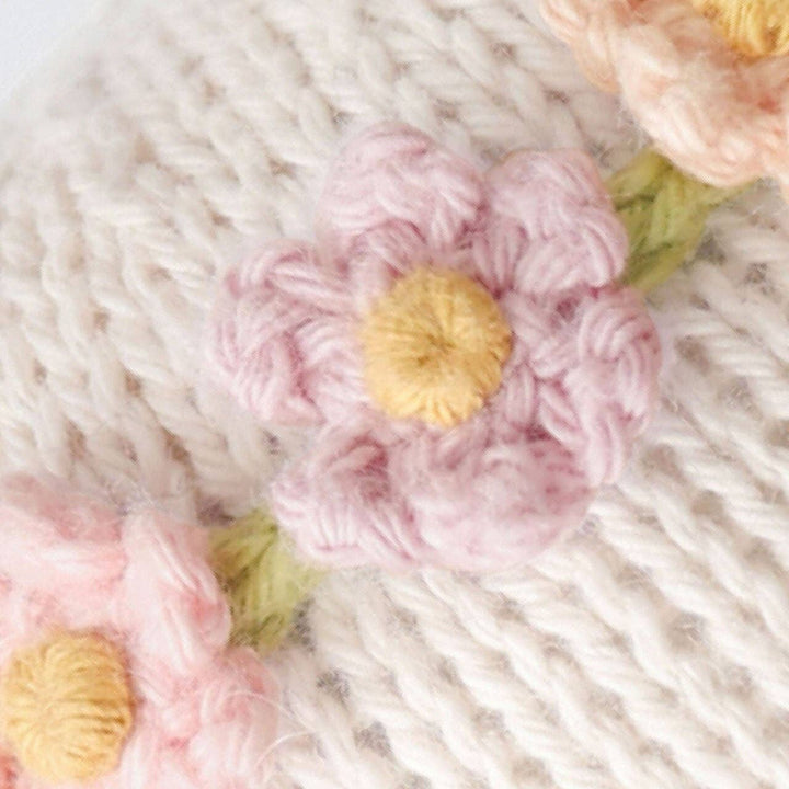 Close up image of the flower crown on Cuddle+Kind&
